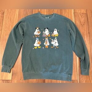 Comfort Colors Green Crewneck Sweatshirt with Halloween Disney Ghost Graphic.